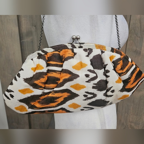 K.C.MALHAN Ikat Printed Woven Cloth Dumpling Chain Bag In Orange/brown Multi. - Picture 3 of 11